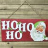 “Ho Ho Ho” with Santa Face Sign