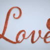 Rusty Metal “Love” Script Wall Art