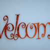 Rusty Metal “Welcome” Script Wall Art