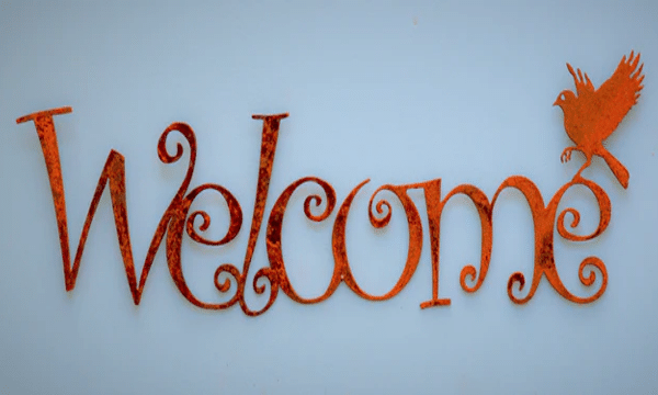 Rusty Metal “Welcome” Script Wall Art