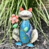 Recycled Metal Cat Holding Flower